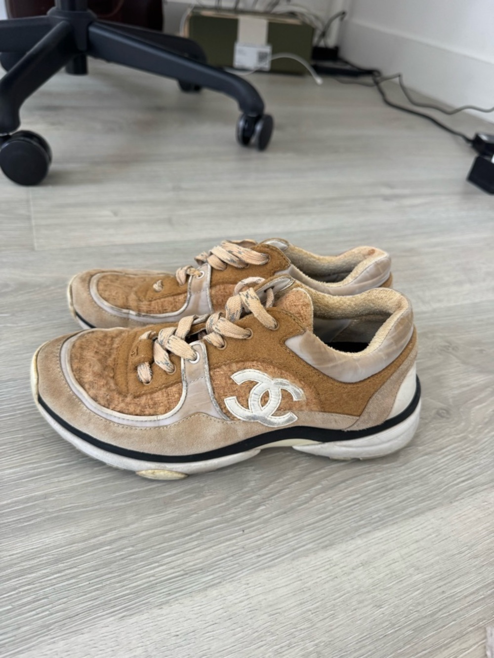 CHANEL beige and white low-top CC trainer sneakers